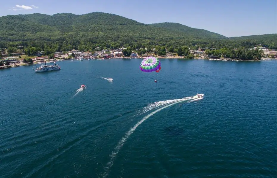 Boats and parasail on Lake George in New York